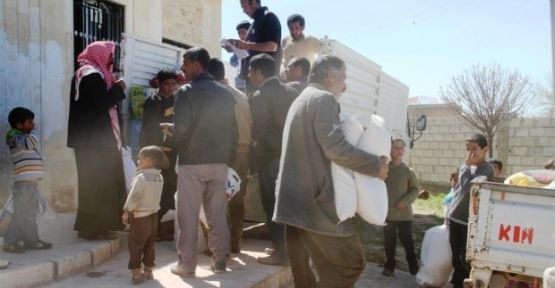 Alîkarî li 750 malbatên gundên Kobanê hate belavkirin