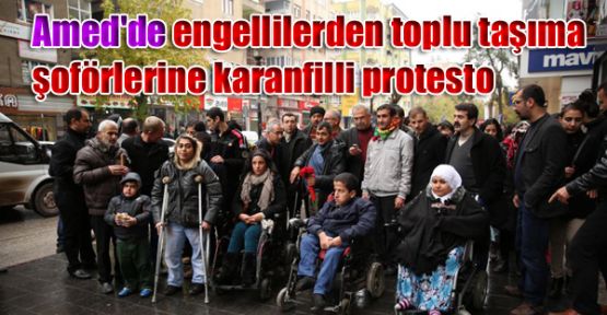 Amed'de engellilerden toplu taşıma şoförlerine karanfilli protesto