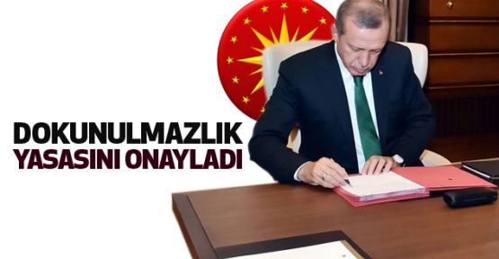 Erdoğan dokunulmazlık yasasını onayladı