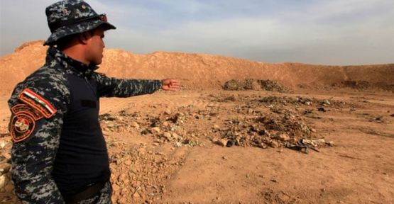 IŞİD vahşeti: Irak'ta 1000 kişinin toplu mezarı bulundu