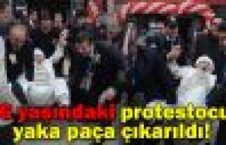 96 yaşındaki protestocu yaka paça çıkarıldı!