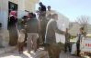 Alîkarî li 750 malbatên gundên Kobanê hate belavkirin