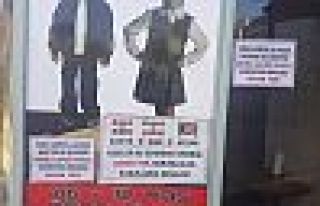 Irkçı afiş asan esnafa 'uyarı' cezası