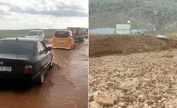 Silvan'da 20 dakikalık yağış: Su basan yola kaya parçaları düştü